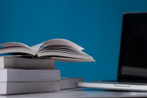 Books and a laptop