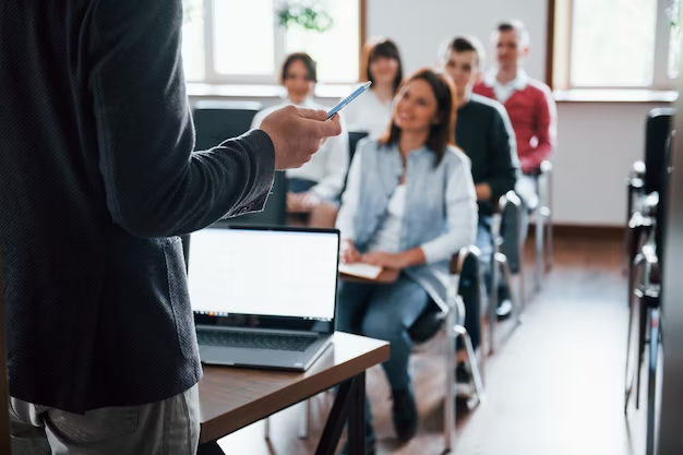 students and someone leading a discussion at the front